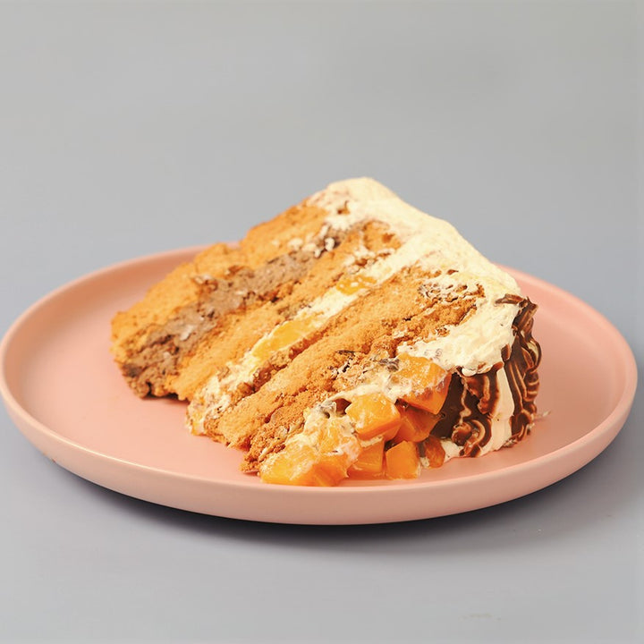Conti’s Pick-up Mango Bravo Slice – a delightful dessert with layers of sweet mangoes, smooth cream, and crunchy graham crackers, creating the perfect balance of flavors.
